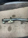 03-06 Nissan 350Z Infiniti G35 Engine Water Coolant Pipe 21021-AM602. Fixed Price $61.43.
