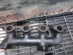 Good Used Case G188D Diesel Engine Exhaust Manifold Part 02113. Fixed Price $119.99.